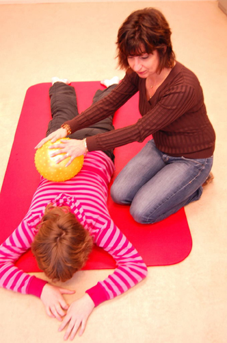 back massage for kid with ball
